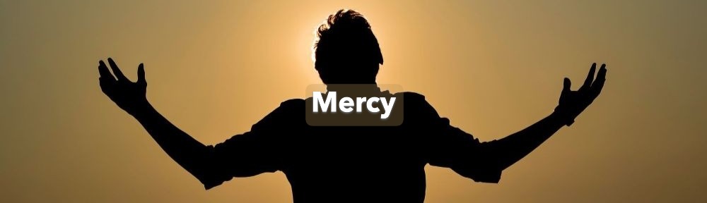 Man with hands up in the air Mercy from God